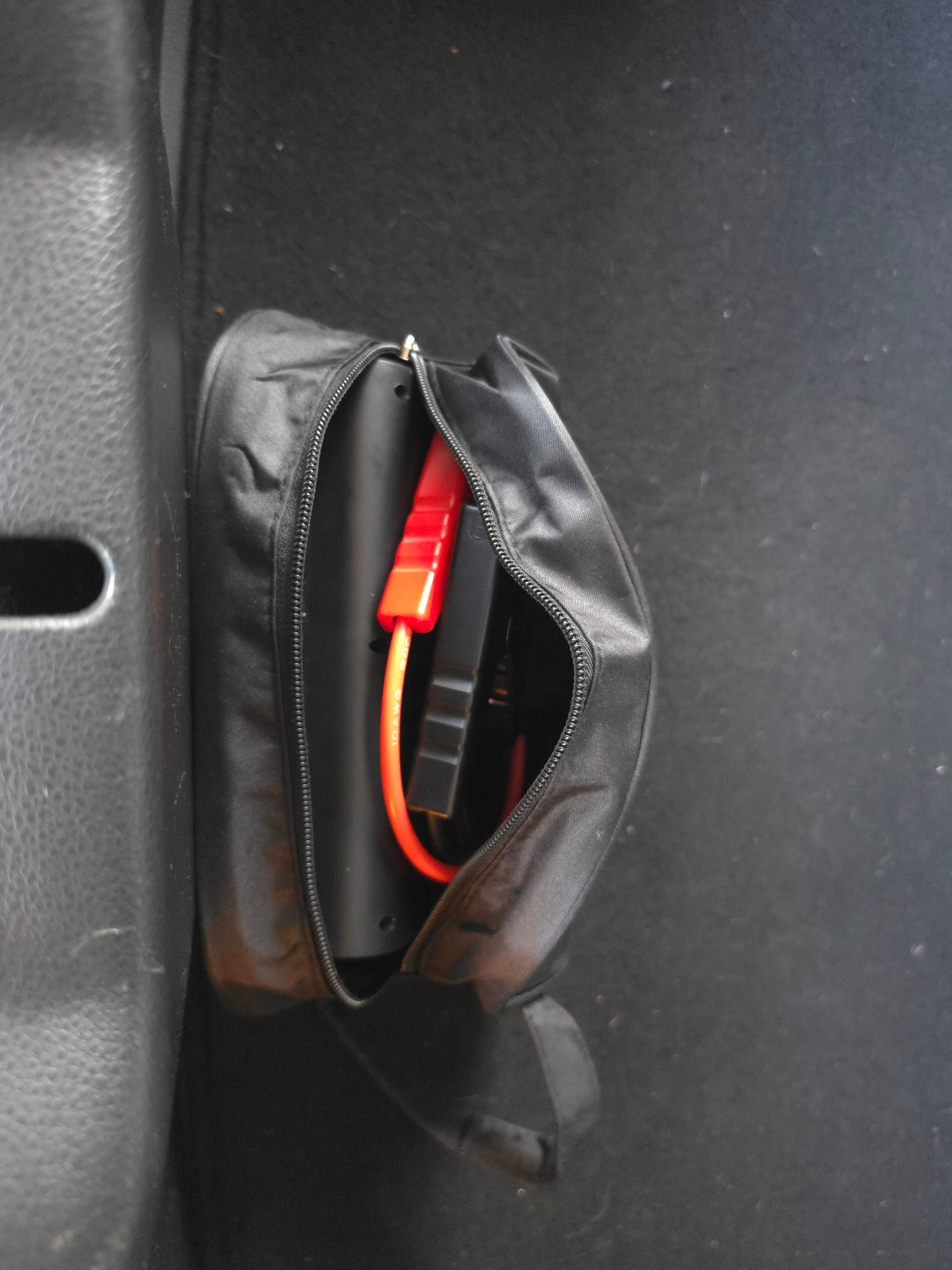 Pompie and accessories inside open carry bag